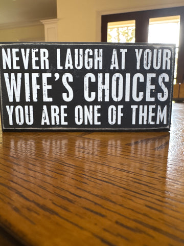 Box sign Never Laugh At Your Wife’s Choices